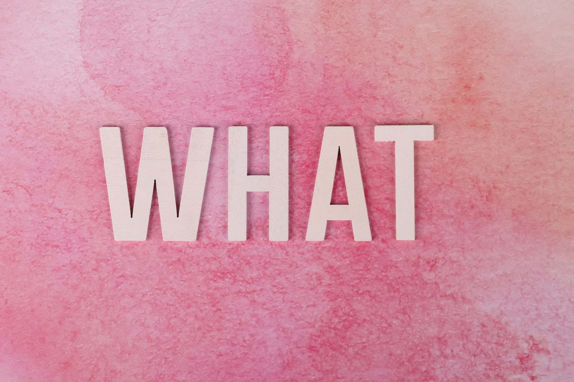 what text on a pink surface