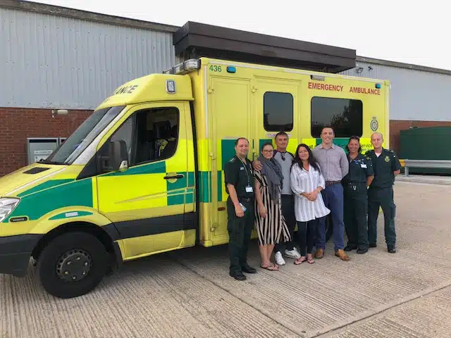 The ambulance crew with family